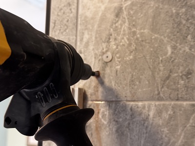 Installing shower door hardware